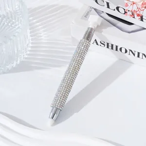 Detailed view of the dual-ended nail art dotting pen covered with sparkling rhinestones