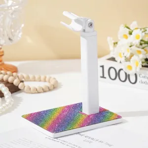 Detail van witte 360-graden roterende nagellampstandaard met regenboogstrass-basis