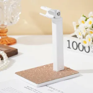 Detailweergave van witte nagellampstandaard met glinsterende roségouden strass-basis, 360 graden.