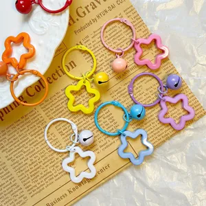 Colorful star-shaped acrylic keychains in candy colors, perfect as bag or case charms.