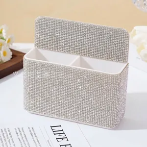 Elegant magnetic pen holder with shimmering rhinestones, dual compartments for desk organization.