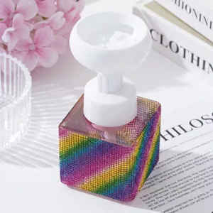 Macro view of a square foaming bottle decorated with rainbow rhinestones