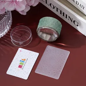 Detailed set of nail art stamping tools with rhinestone stamper and scraper