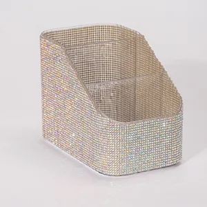 Detailed macro view of an iridescent rhinestone-encrusted 3-slot makeup brush holder.