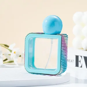 Refillable 40ml square perfume spray bottle decorated with gradient colorful rhinestones