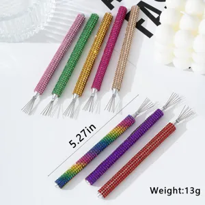 Detailed view of multi-colored rhinestone nail art spider gel tools with 5.27in length.