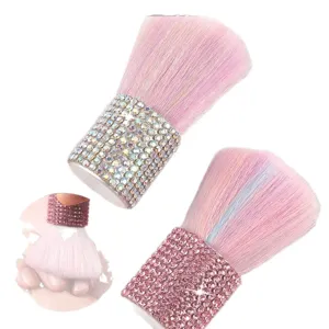 Pink rhinestone makeup brush for powder and nail cleaning with gradient bristles.