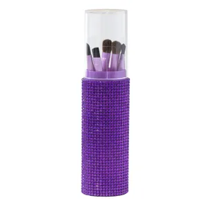 Purple rhinestone-encrusted makeup brush set with 5 pieces in a clear storage tube