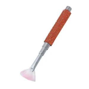 Professional fan shaped nail art brush with sparkling orange rhinestone encrusted handle