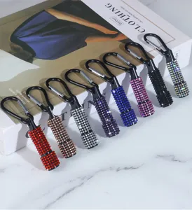Mini rhinestone decorated flashlights with carabiner clips in various bright colors