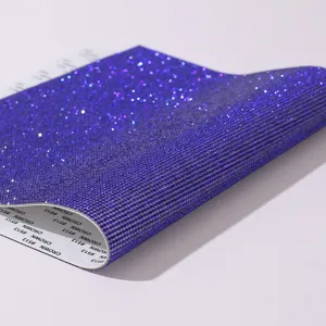 Close-up of sparkling purple self-adhesive rhinestone mesh for DIY decorations