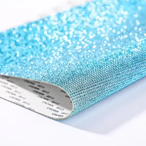 Macro view of blue self-adhesive sparkly rhinestone mesh sticker for DIY crafts
