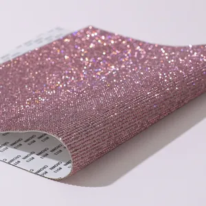 Macro detail of pink self-adhesive rhinestone sheet for DIY car and craft decoration