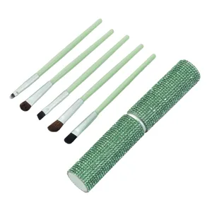 Professional 5-piece makeup brush set with a luxury green rhinestone storage cylinder case