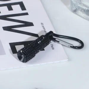 Compact black studded rhinestone flashlight keychain with a durable carabiner clip
