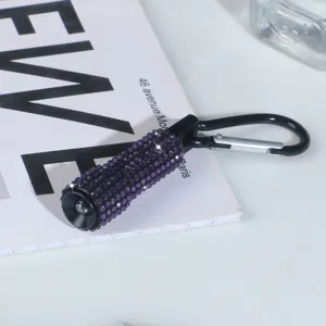 Luxury purple rhinestone mini LED flashlight with black carabiner clip for outdoor use
