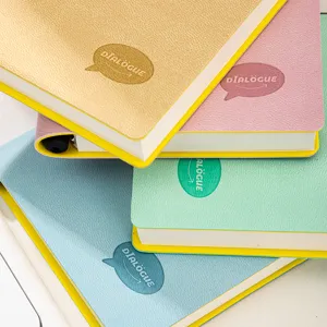 Mini portable pocket notebook set with colorful covers and pen holder for daily memo writing.