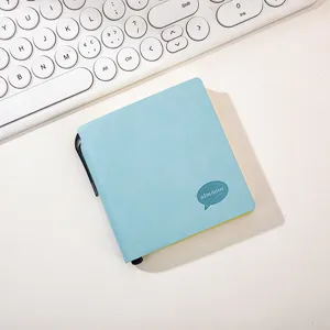 Portable mini pocket notebook compact square memo pad for daily writing and school use.