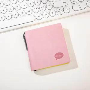 Pink portable mini pocket notebook with pen holder and cute cover text design for daily use.