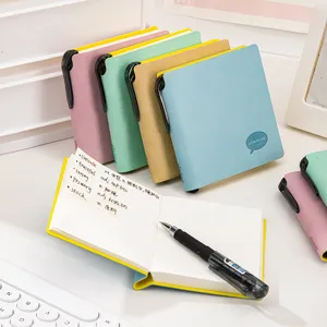 Mini portable pocket notebook with pen, cute square notepad for students and daily memo.