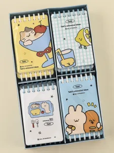 Detailed view of four cute A7 coil-bound notebooks with whimsical illustrations