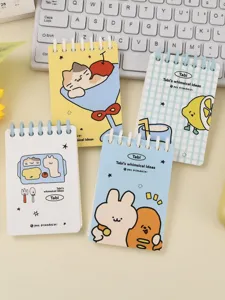 Macro view of four A7 spiral notebooks with cute cartoon animal illustrations