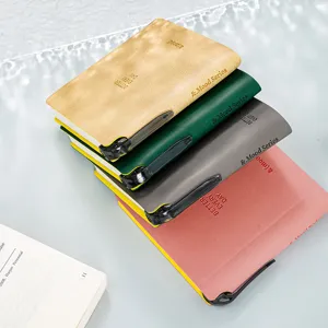 Portable pocket notebook with pen, colorful leather small memo pad for daily note taking.