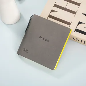 Mini portable square notebook with pen pocket memo diary for student daily writing use.