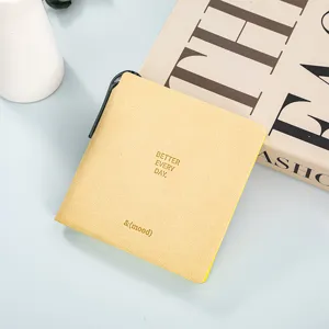 Portable square pocket notebook with pen, cute mini memo diary for students daily use.