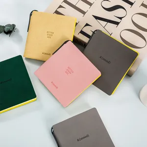 Portable mini square notebook for students, colorful pocket memo pad with pen holder daily use.