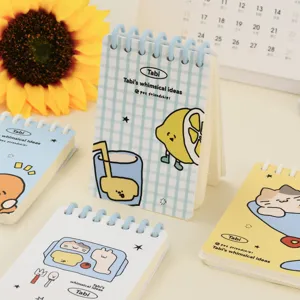 Cute A7 spiral mini notebook with whimsical cartoon illustrations and colorful cover designs