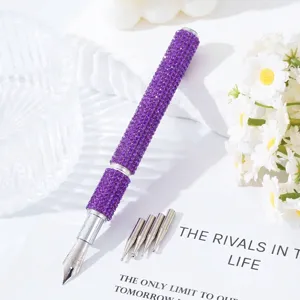 Detail view of purple rhinestone nail art pen with 5 interchangeable metal tips.