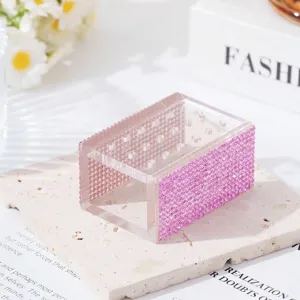 Detail view of the 18-hole acrylic drill bit box featuring pink rhinestone siding
