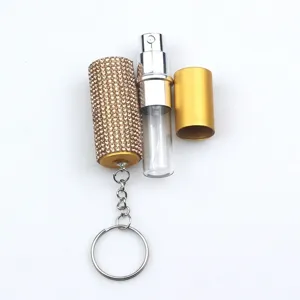 Detailed view of 5ml rhinestone refillable perfume atomizer spray bottle with keychain hook