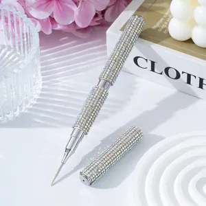 Close-up of double-ended nail art pen fully encrusted with sparkling rhinestones