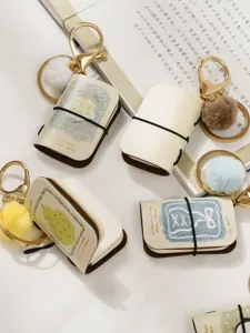 Mini PU leather notebook keychain cute pendant bag charm with plush pom pom and metal ring