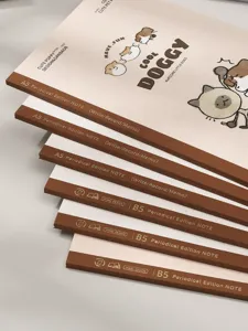 Pila de cuadernos minimalistas A5 y B5 con diseños de cachorros lindos