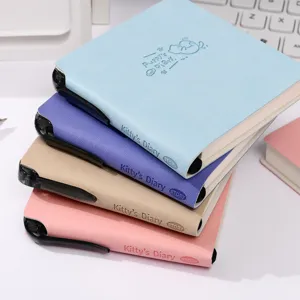 Colorful pocket leather notebook diary set with pen, portable soft cover planner for office work.