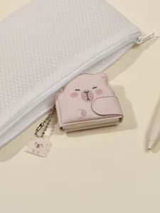 Cute capybara mini notebook pendant with bead chain and white mesh pouch detail view