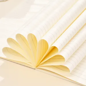 Minimalist B5 glue-bound notebook with horizontal lines, pages folded into a fan shape