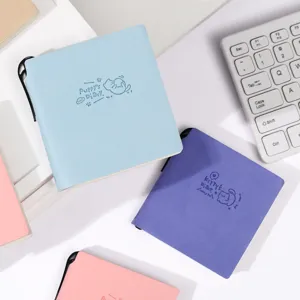 Portable mini soft leather pocket notebook with cute puppy and kitty embossed design for daily use.