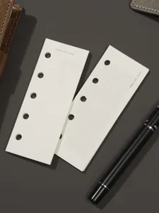 Papier de recharge pour agenda à anneaux quadrillé et vierge carnet de notes détail.