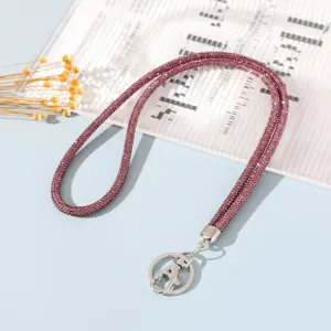 Close-up of 6-row purple rhinestone lanyard with durable metal lobster clasp