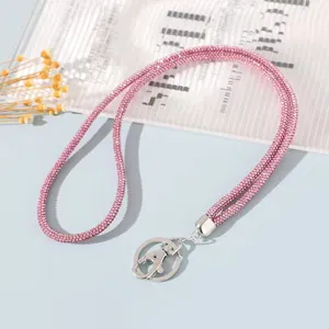 Macro view of a pink sparkling 6-row rhinestone lanyard with a sturdy silver metal clasp