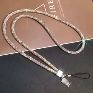 Close-up of luxury sparkling multicolored rhinestone lanyard with metal charm