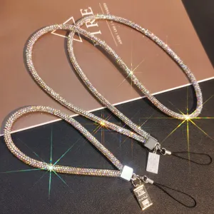 Detailed macro shot of luxury sparkling rhinestone phone lanyard with vibrant diamond shine