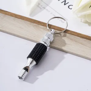 Silver aluminum survival whistle with black rhinestone grip and keychain accessory