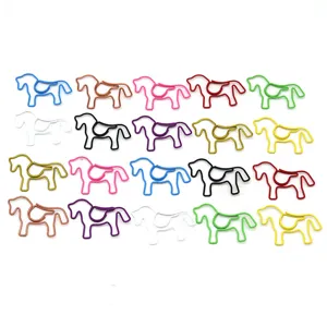 Detailed view of colorful horse-shaped metal paperclips in a neat grid arrangement
