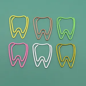 Tooth-shaped colored metal paper clips set, creative stationery for office document organization.