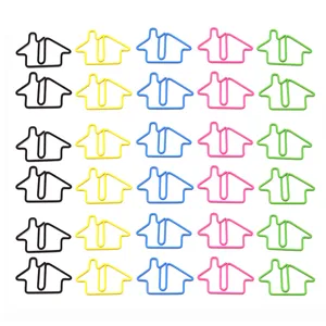 Metal house shaped paper clips detail shot, colorful creative stationery for office and school use.